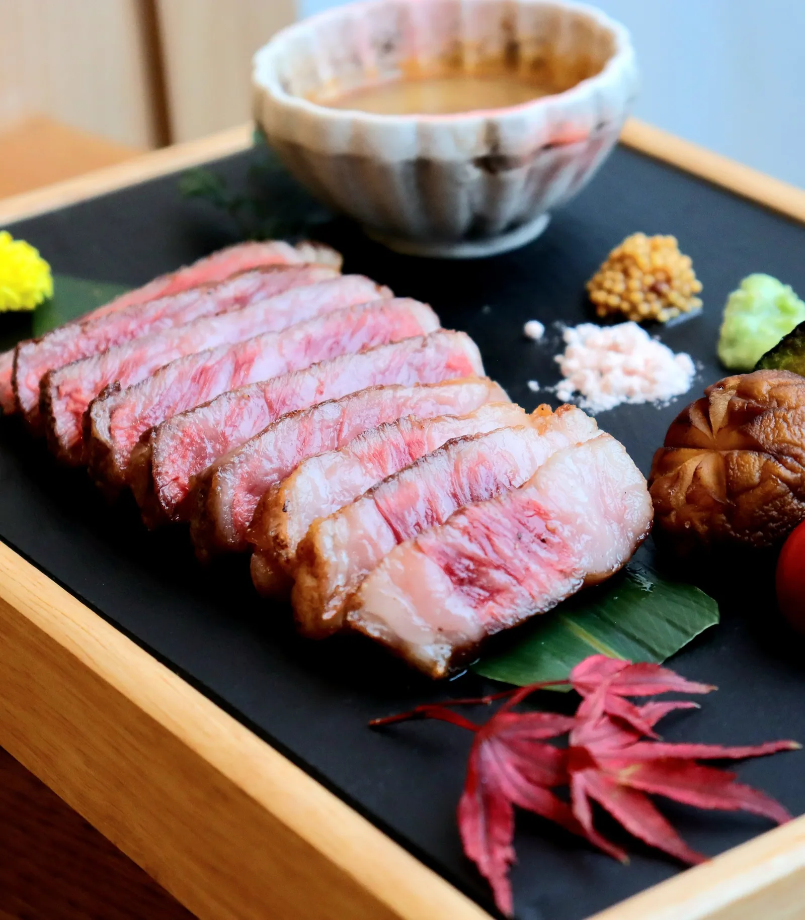 Sliced Kagoshima wagyu A5 with condiments at Washo, Bangkok